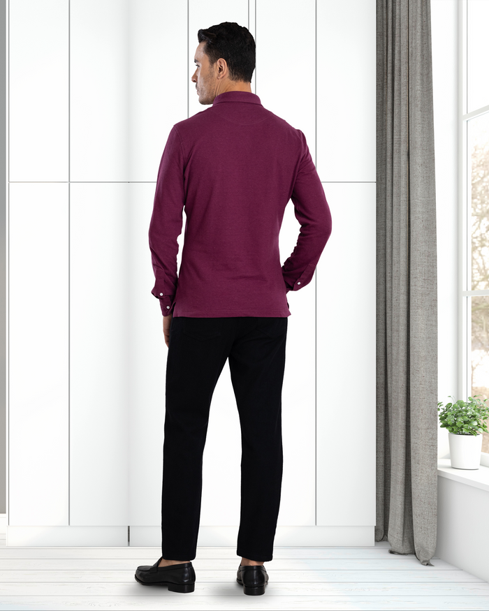 Back of model wearing mens wool jeans by Luxire in black