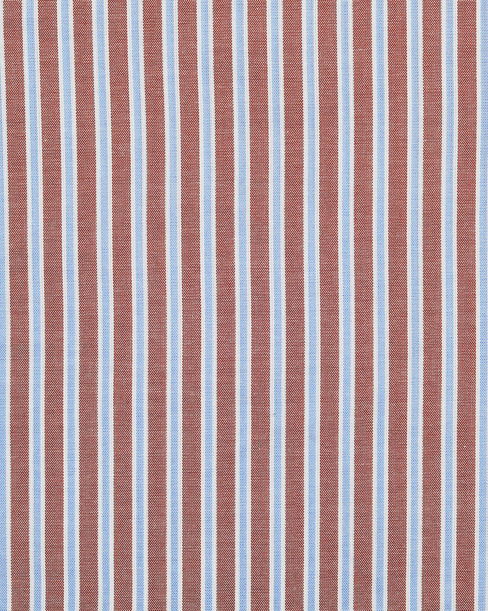 Close up of the custom oxford shirt for men by Luxire with blue white and rust stripes