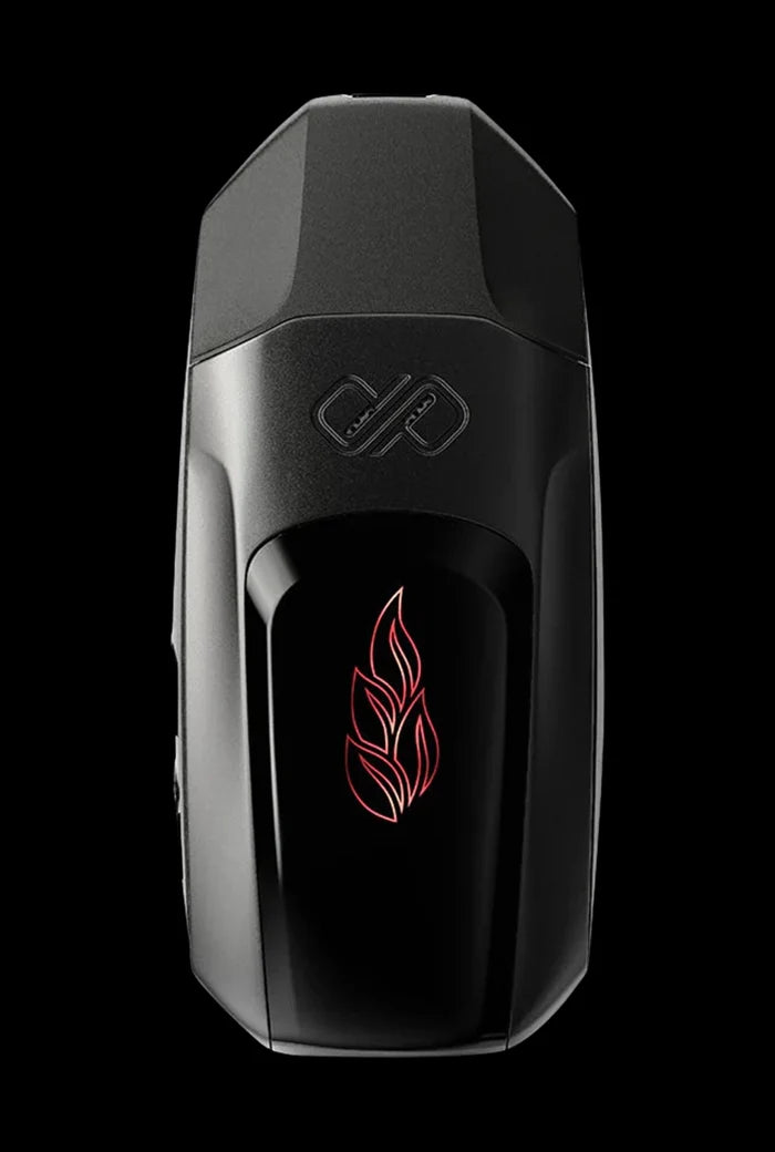Top-down close-up of the black Boundless Vexil Dry Herb Vaporizer showing its glossy front panel with a red flame-leaf icon and textured matte mouthpiece against a black background.
