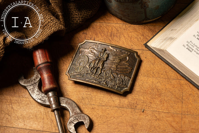 Brass Cowboy With Caravan Belt Buckle