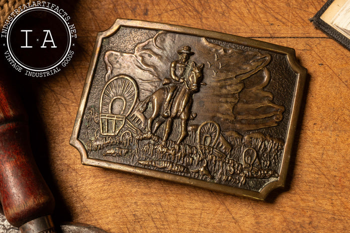 Brass Cowboy With Caravan Belt Buckle