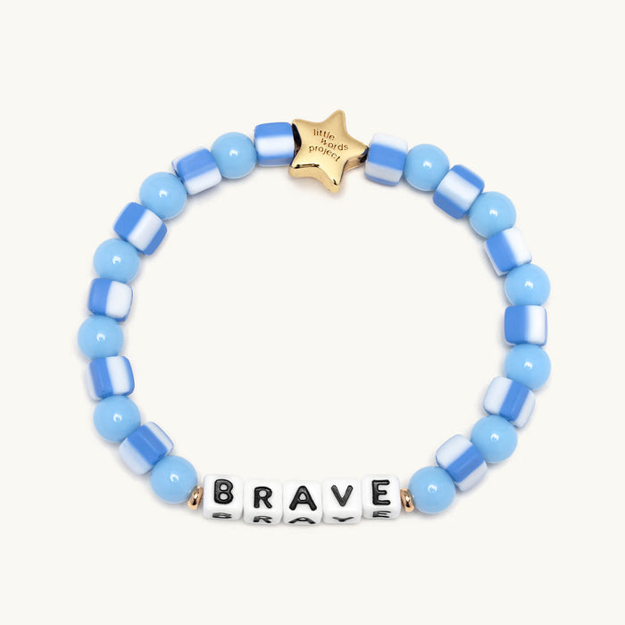 Blue beaded bracelet with 'BRAVE' word on a white background