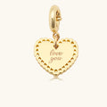 Gold heart-shaped pendant with 'love you' engraving on a white background