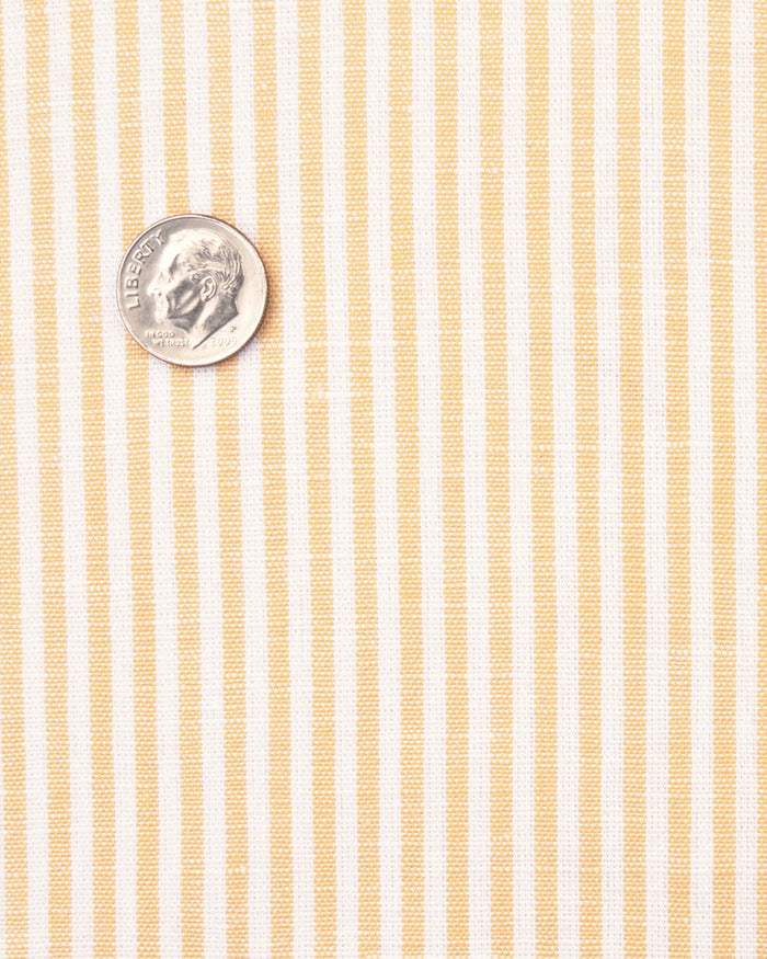 Close up of the custom linen shirt for men in yellow candystripes by Luxire Clothing