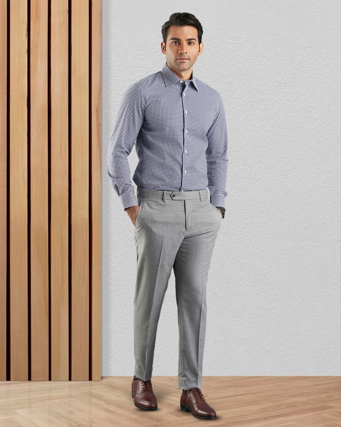 Front view of custom check shirts for men by Luxire navy small gingham hands in pockets 2