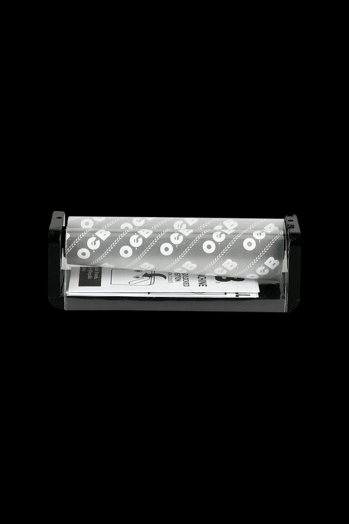 A top-down view of the OCB Classic Cone Roller Machine - 6 Pack, with the six rollers neatly arranged on a white surface.