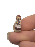 Resin Woman Holding Flower Bouqet - Signed PR